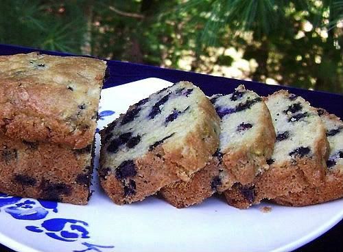 /><br/> <br/> <br/> BLUEBERRY WHITE CHOCOLATE CHEESECAKE ZUCCHINI BREAD<br/> <br/> 3 eggs, beaten<br/> 1 c. granulated sugar<br/> 2 tsp. vanilla extract<br/> 1/8 tsp. cheesecake flavored oil (optional)<br/> 1 c. canola OR vegetable oil<br/> Juice and grated rind of 1 lemon<br/> 2 c. peeled, grated zucchini<br/> 3 c. all-purpose flour<br/> 1 (4-serving size) pkg. cheesecake instant pudding mix<br/> 1 tsp. salt<br/> 1 tsp. baking soda<br/> 1/2 tsp. baking powder<br/> 3 oz. white chocolate, grated OR finely chopped<br/> 2 c. fresh or frozen blueberries (if using frozen blueberries, do not thaw)<br/> <br/> Preheat oven to 350 degrees. Grease (2) 9x5-inch OR (5) 5x3-inch loaf pans; set aside.<br/> <br/> Place shredded zucchini in a mesh strainer to drain; set aside while assembling other ingredients.<br/> <br/> In a large bowl, whisk together eggs, sugar, vanilla, cheesecake oil (if using), canola oil, lemon juice and lemon rind until light.<br/> <br/> Squeeze excess moisture out of shredded zucchini; stir into egg mixture.<br/> <br/> In a medium bowl. combine flour, cheesecake pudding mix, salt, baking soda, baking powder and grated white chocolate; mix well. Add all but about 1/4 cup flour mixture to egg mixture; stir just until combined.<br/> <br/> Toss blueberries in the remaining flour mixture; gently fold berries and whatever flour mixture is left into the bread batter just until combined.<br/> <br/> Divide batter between prepared pans. Bake @ 350 degrees for 45-60 minute for the large loaves and 35-45 minutes for the smaller loaves, or until a toothpick inserted in the center comes out clean.<br/> <br/> Let breads cool in pans on wire rack for 15 minutes; remove from pans to wire rack and cool completely, Makes 2 large or 5 small loaves.<br/> <br/> <img src=